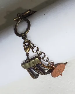 YKK Zipper and South African Coin Bracelet