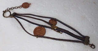 YKK Zipper and South African Coin Bracelet