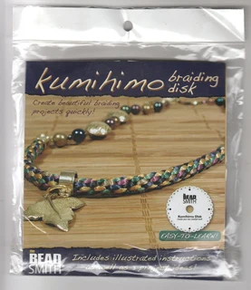 The Bead Smith Kumihimo Round Braiding Disc and 7 No Tangle Beadsmith Thread Bobbins - Crafts