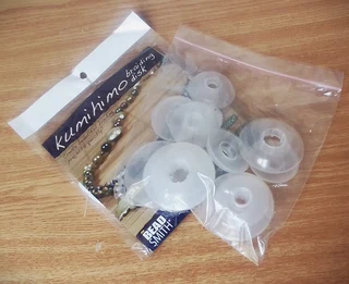 The Bead Smith Kumihimo Round Braiding Disc and 7 No Tangle Beadsmith Thread Bobbins - Crafts