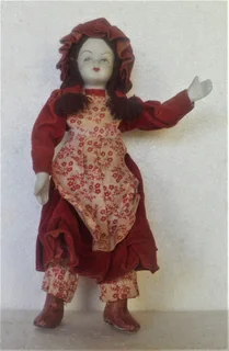 Vintage - Small Porcelain Doll with Bendable  arms and legs