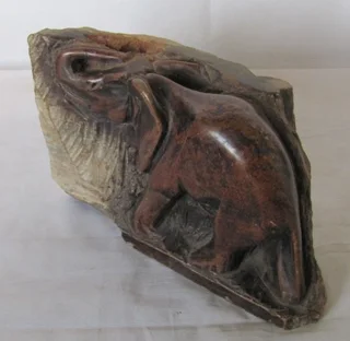 Rhodesian 1970's Hand Carved Stone Elephant in a Rock