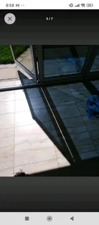 Glass tinting and decorative sandblasting