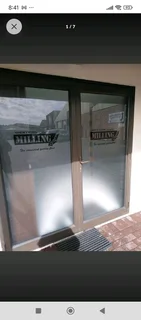 Glass tinting and decorative sandblasting
