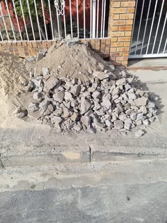 BUILDING RUBBLE AND ALL OTHER RUBISH REMOVED