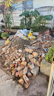 BUILDING RUBBLE AND ALL OTHER RUBISH REMOVED