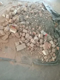 BUILDING RUBBLE AND ALL OTHER RUBISH REMOVED