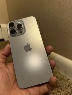 Pre owned iPhone 15 pro max 512gb natural titanium.