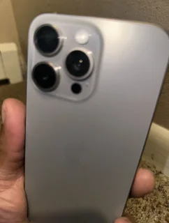 Pre owned iPhone 15 pro max 512gb natural titanium.