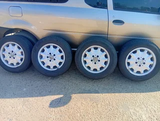 1999 Mercedes-Benz E230  (W210) has a bolt pattern (PCD) of 5x112mm  rims and tyres