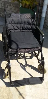 Wheelchair affordable,foldable,steel frame heavy duty with detachable foot rest pedals.