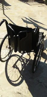 Wheelchair affordable,foldable,steel frame heavy duty with detachable foot rest pedals.