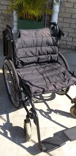Wheelchair affordable,foldable,steel frame heavy duty with detachable foot rest pedals.