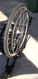 Wheelchair affordable,foldable,steel frame heavy duty with detachable foot rest pedals.