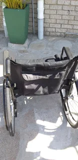 Wheelchair affordable,foldable,steel frame heavy duty with detachable foot rest pedals.