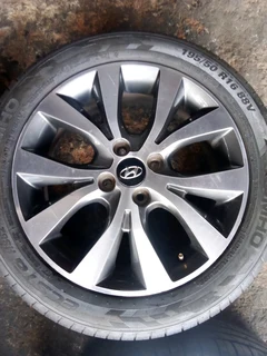 We are selling a set of clean 16 original Hyundai accent mag rims with new tyres 195/50 16 Kumho,