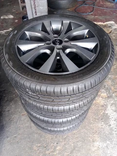 We are selling a set of clean 16 original Hyundai accent mag rims with new tyres 195/50 16 Kumho,