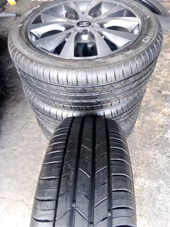 We are selling a set of clean 16 original Hyundai accent mag rims with new tyres 195/50 16 Kumho,