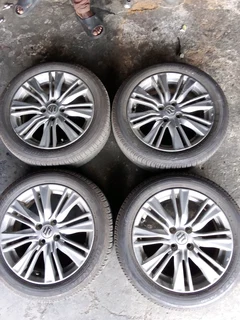 We are selling a set of clean 16 inch as good as new Suzuki mag wheels with 90% Bridgestone tyres