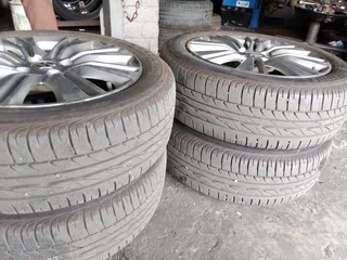 We are selling a set of clean 16 inch as good as new Suzuki mag wheels with 90% Bridgestone tyres