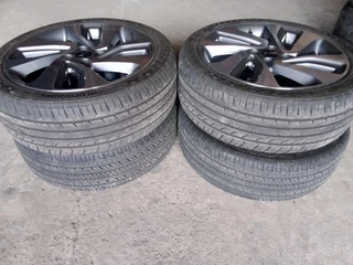 17 inch original ki a rio mag rims with 90% tyres