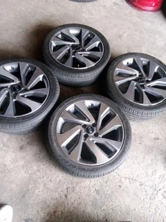 17 inch original ki a rio mag rims with 90% tyres