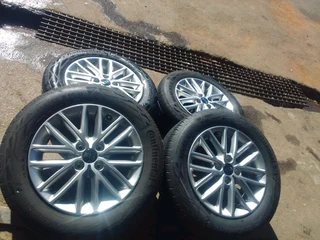 15 inch clean original ki a rio mag rims with good tyres in a very good condition