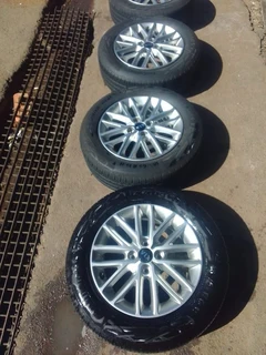 15 inch clean original ki a rio mag rims with good tyres in a very good condition