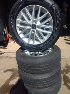 15 inch clean original ki a rio mag rims with good tyres in a very good condition