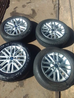 15 inch clean original ki a rio mag rims with good tyres in a very good condition