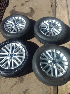 15 inch clean original ki a rio mag rims with good tyres in a very good condition