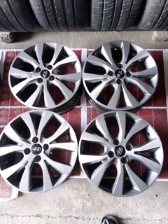 16 inch clean as good as new 16 inch original hyundai accent mag rims, the rims.