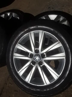 We are selling a set of clean 15 inch original polo t s i mag rims with 80% continental tyres