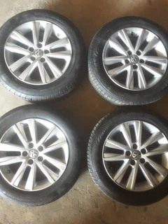 We are selling a set of clean 15 inch original polo t s i mag rims with 80% continental tyres