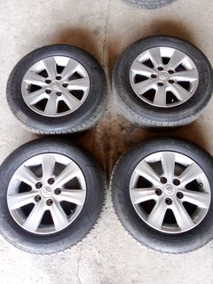 15 inch Original Toyota Corolla quest mag rims in good condition