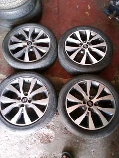 16 inch original Hyundai accent mag rims all clean with 90% new tyres kumho as good as new what you