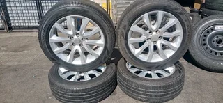 We are selling a set of 20 inch Ranger Rover mag rims with Good tyres in a VERY GOOD CONDITION
