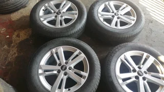 We are selling a set of clean original 17 inch Audi Q3 mag rims with good quality tyres