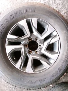 18 inch original Fortuner mag rim for spare,The rim is as good as new .
