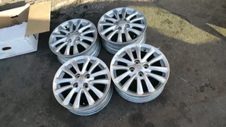 We are selling a set of 15 inch original Toyota Etios mag rims in a very good condition