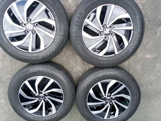We are selling a set of 15 inch as good as new Polo wheels with 80% Goodyear tyres