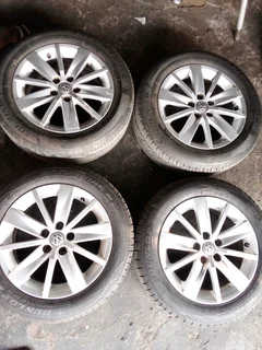 We are selling a set of 15 inch Polo TSI mag rims with 90% tyres two Dunlop and two Firestone