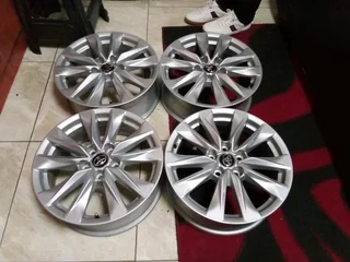 We are selling a set of 17 inch clean as good as new Toyota mag rims original. Pcd 5/114.3