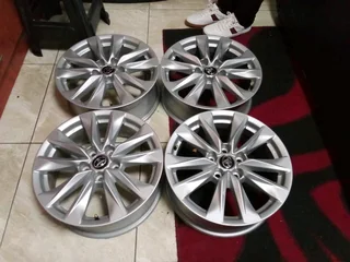 We are selling a set of 17 inch clean as good as new Toyota mag rims original. Pcd 5/114.3