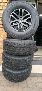 We are selling a set of clean 17 inch original Ford raptor mag rims with good Dunlop GrandTrek A/T