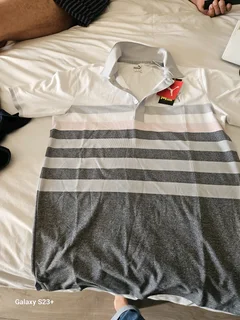Puma golfer shirt brand new size medium retail price is 900