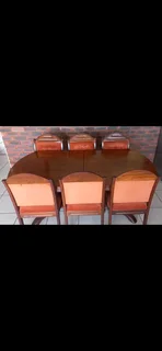 Imbuia Antique Diningroom table and chairs in excellent condition  asking Price R25000