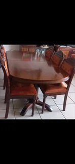 Imbuia Antique Diningroom table and chairs in excellent condition  asking Price R25000