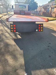 TOW TRUCK MANUFACTURER ROLL BACK TRUCK FLOOR