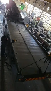 TOW TRUCK MANUFACTURER ROLL BACK FLOOR